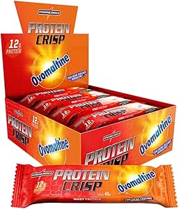Barra de Proteína Whey. Caixa com 12 unidades da marca Integralmedica com embalagens individuais em destaque.